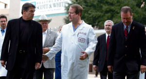 Perry visits wounded